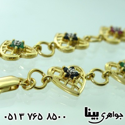 دستبند چند جواهر درشت یاقوت و زمرد و الماس زنانه قلبی