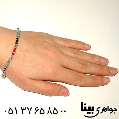 دستبند چند جواهر زنانه یاقوت و زمرد طرح کیهانه