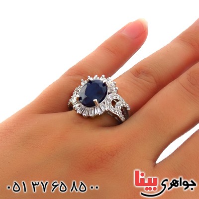 انگشتر یاقوت کبود زنانه درشت رودیوم مدل شنتیا _کد:13477