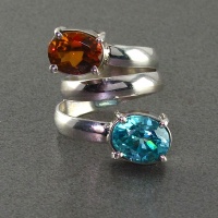 انگشتر چند جواهر توپاز و الکساندریت زنانه فری سایز 