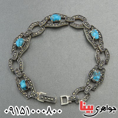 دستبند فیروزه نیشابوری و حدید مارکازیتی درشت زنانه دستبند فیروزه نیشابوری و حدید مارکازیتی درشت زنانه