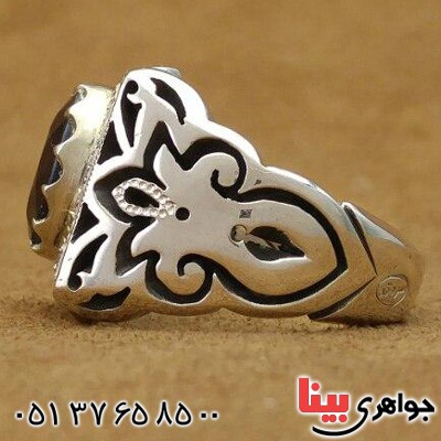 انگشتر یاقوت کبود دور الماس مدل شبکه ای _کد:20093