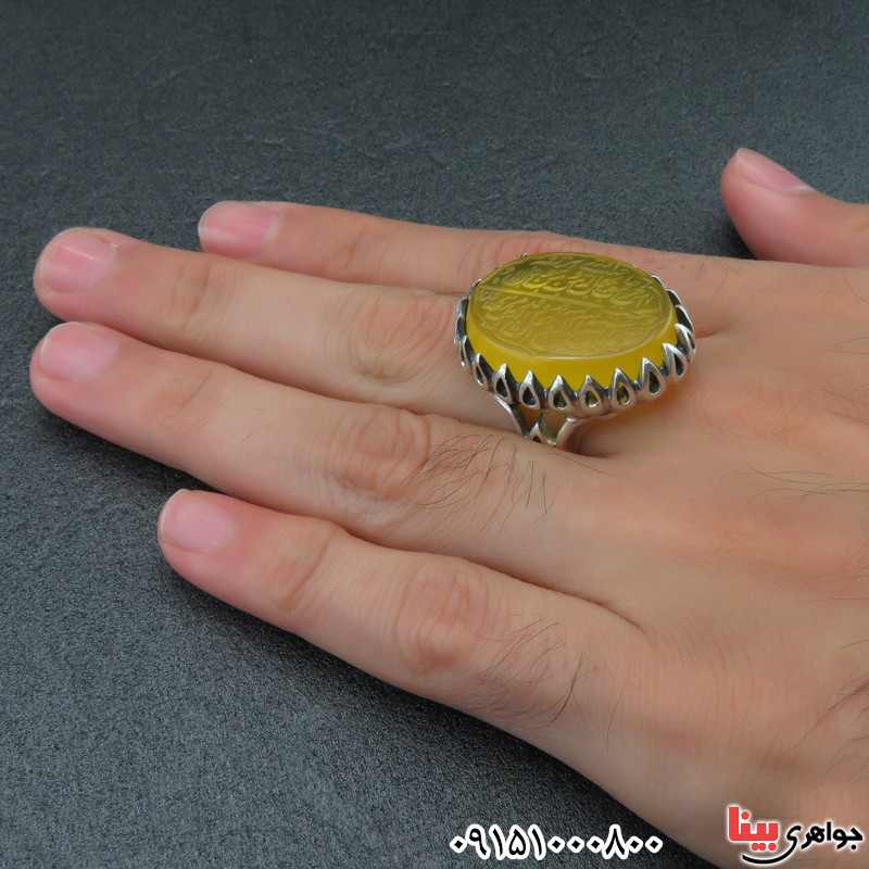 انگشتر عقیق زرد درشت خطی با حکاکی و من یتق الله _کد:27731 انگشتر عقیق زرد درشت خطی با حکاکی و من یتق الله _کد:27731