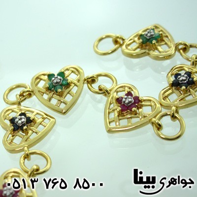 دستبند چند جواهر درشت یاقوت و زمرد و الماس زنانه قلبی