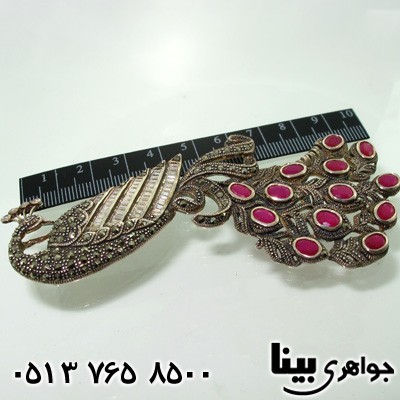 گردنبند یاقوت سرخ و گل سینه طاووسی