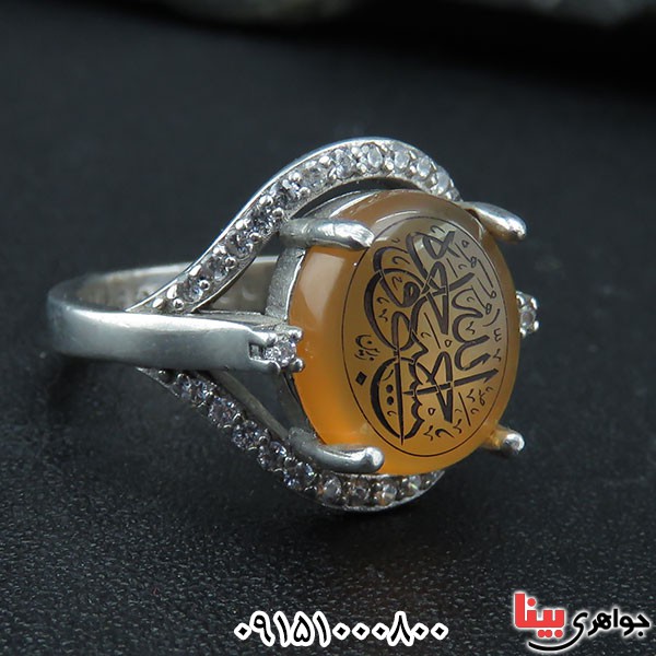 انگشتر عقیق یمنی پرتقالی بسیار جذاب با حکاکی حسبی الله آبکاری طلا _کد:33758