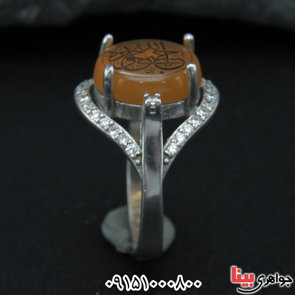 انگشتر عقیق یمنی پرتقالی بسیار جذاب با حکاکی حسبی الله آبکاری طلا _کد:33758