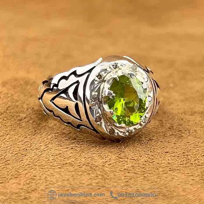 انگشتر زبرجد با مخراج 10 قطعه الماس _کد:35035