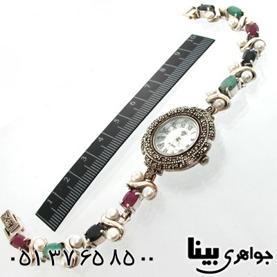 ساعت چند جواهر زمرد و یاقوت سرخ و کبود دایره ای زنانه