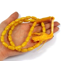 تسبیح کهربا پودری 33 دانه درشت بیضی کرم