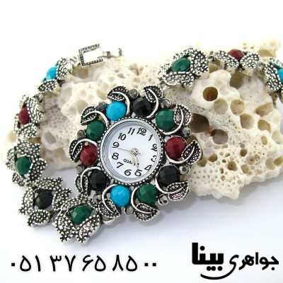 ساعت حدید و چند نگین رنگی زنانه طرح مارکازیتی مدل گل _کد:8602