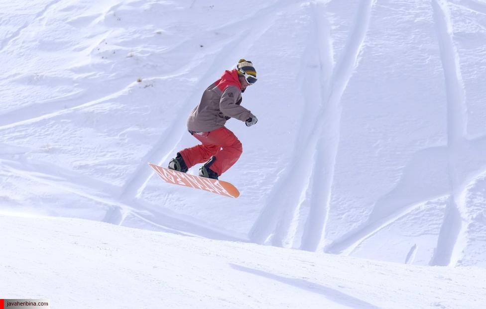 Iranian man snowboards at the Dizin ski resort, northwest of Tehran